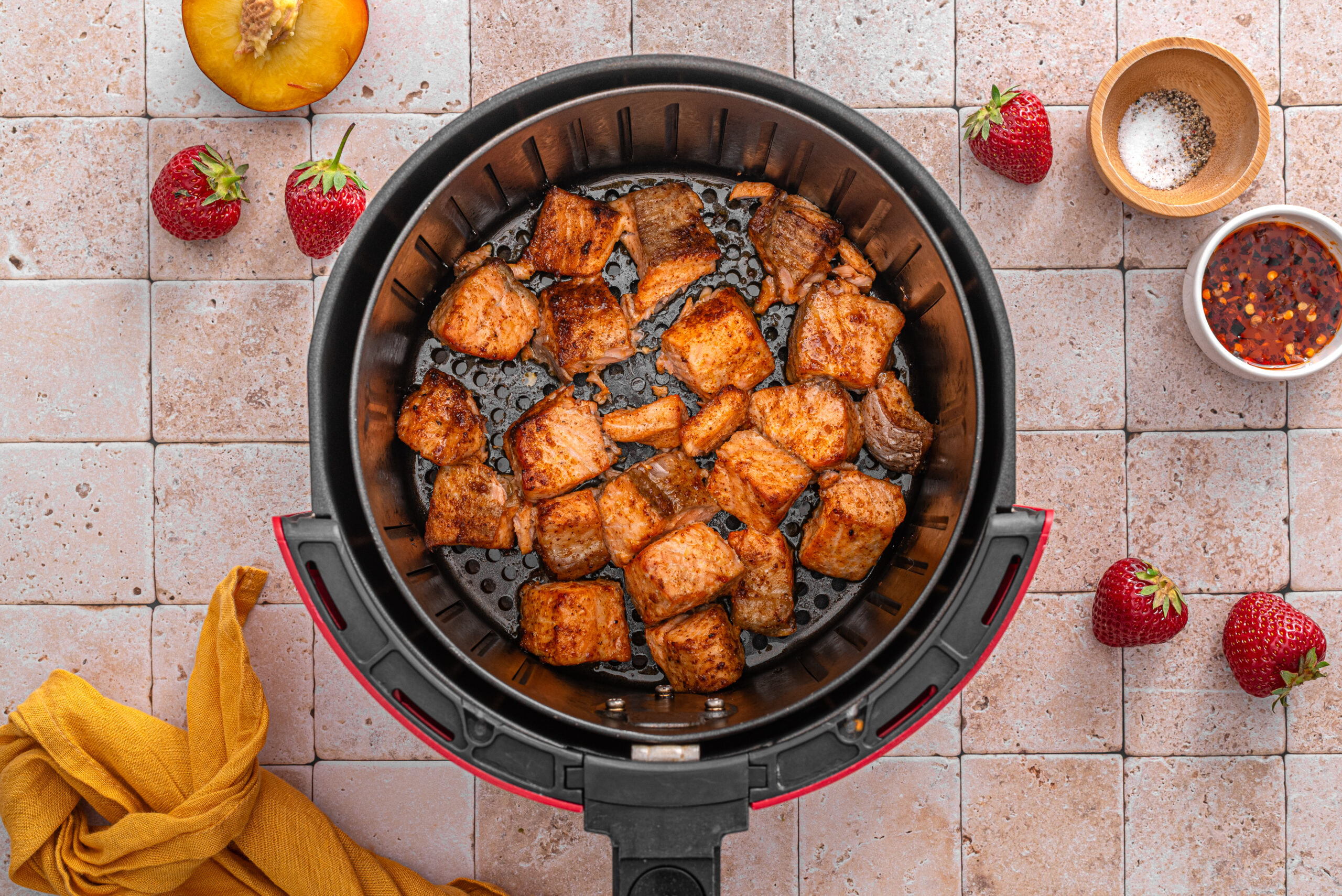 this shows me air-frying the salmon