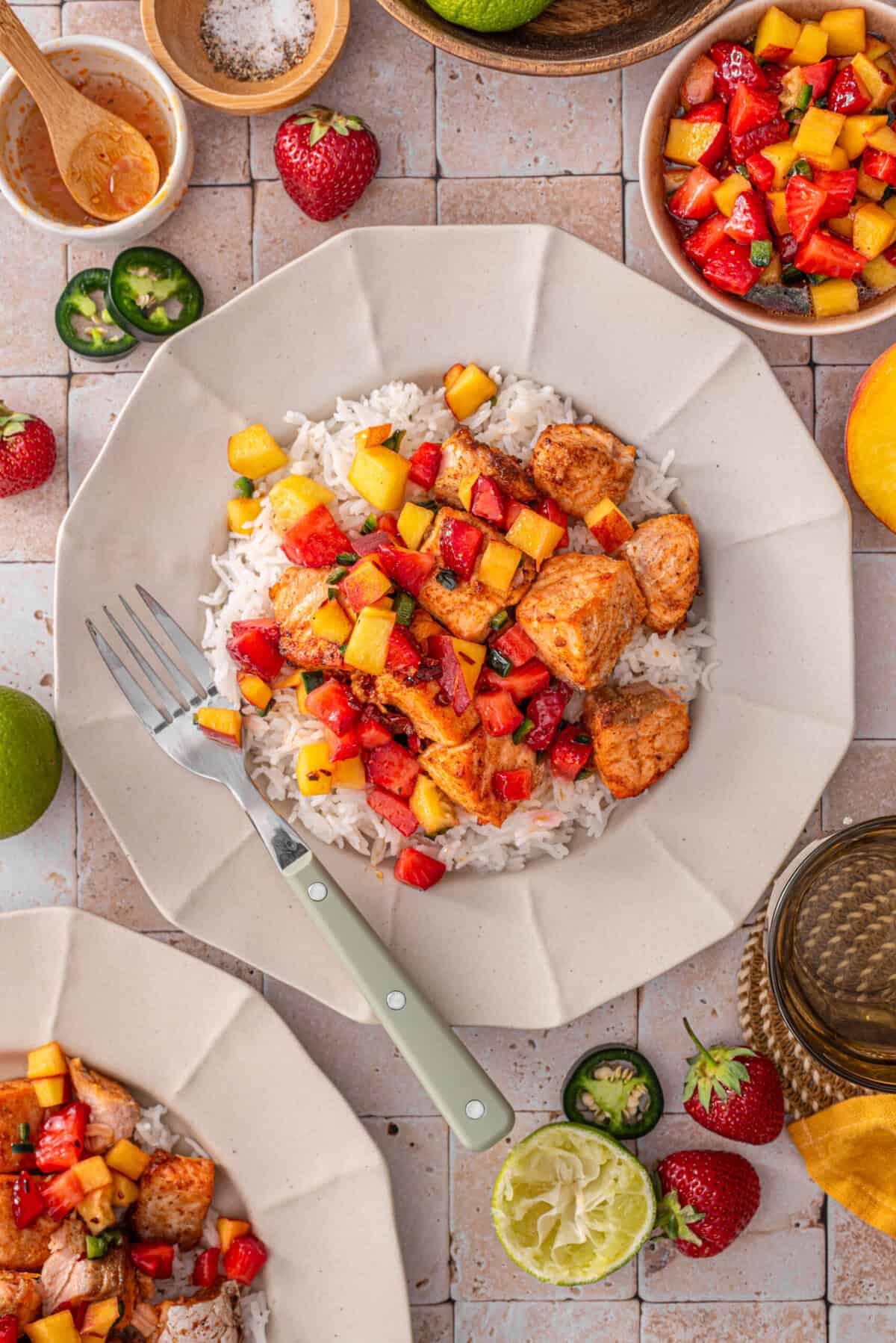this is an overhead close up of my air-fryer salmon with strawberry salsa in a bowl 