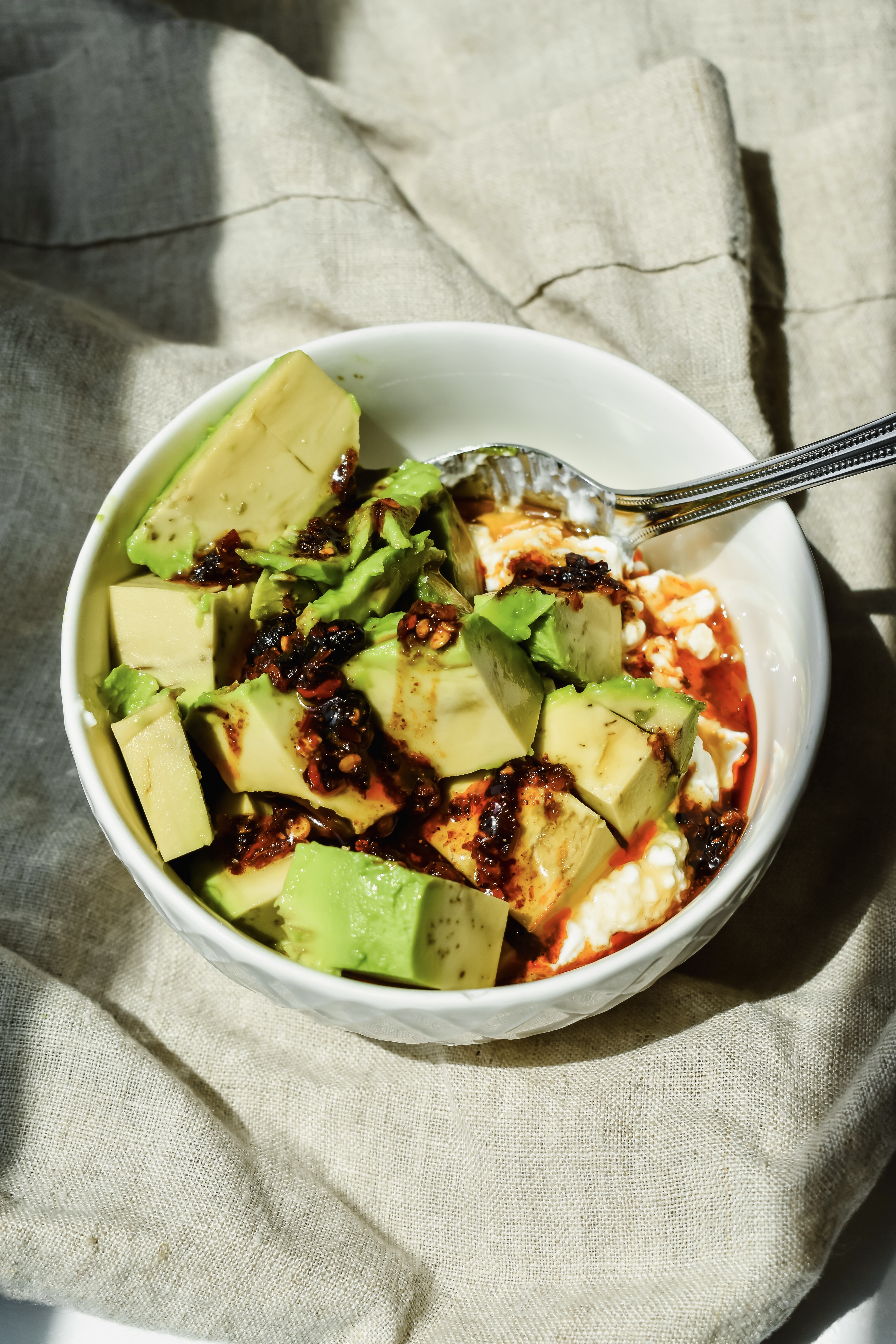 this is a close up of my cottage cheese and avocado bowl 
