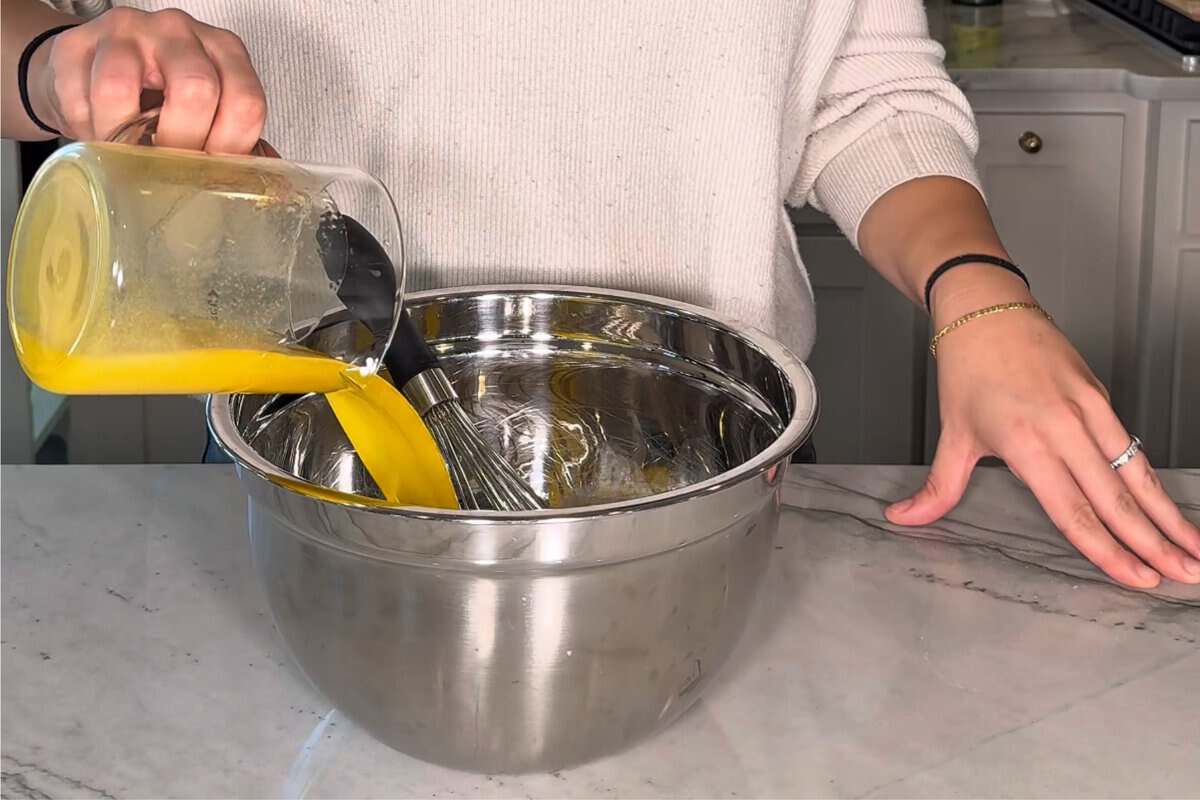 this shows me adding butter into a large mixing bowl