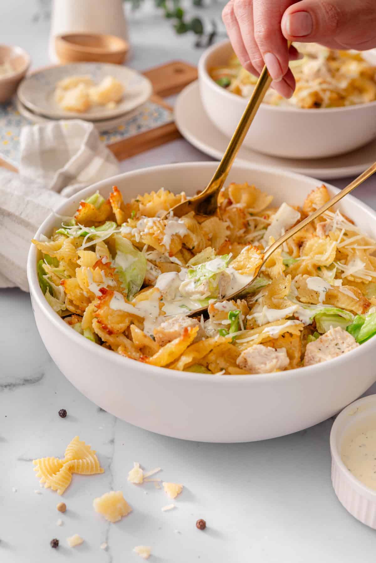 this is a side view close up of my delicious and easy crispy caesar pasta salad recipe with chicken