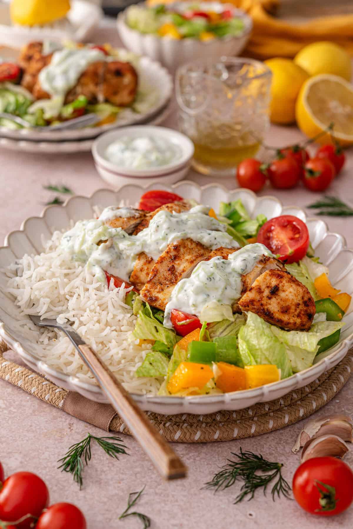this is a side view close up of my easy mediterranean chicken bowl with tzatziki 