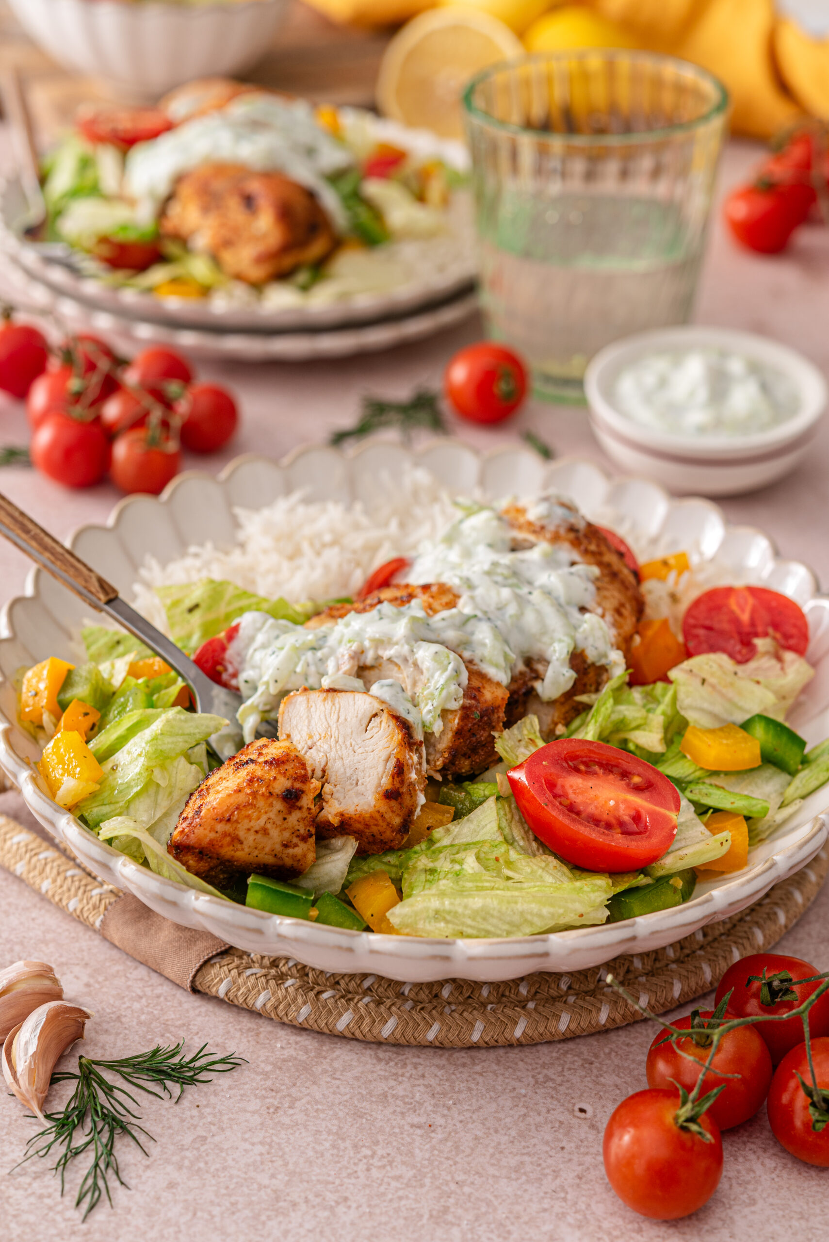 this is a side view close up of my easy mediterranean chicken bowl with tzatziki 