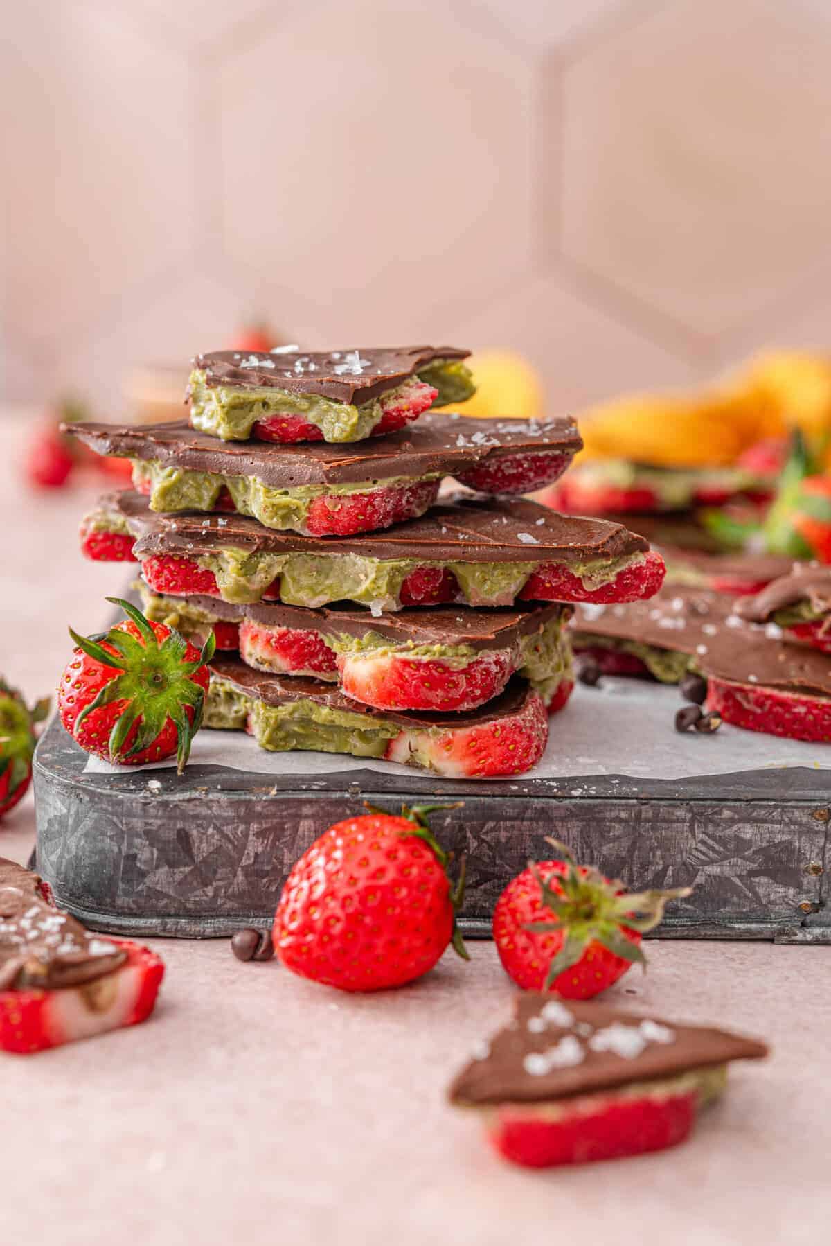 this is a side view close up of my dubai chocolate strawberry bark stacked on top of each other