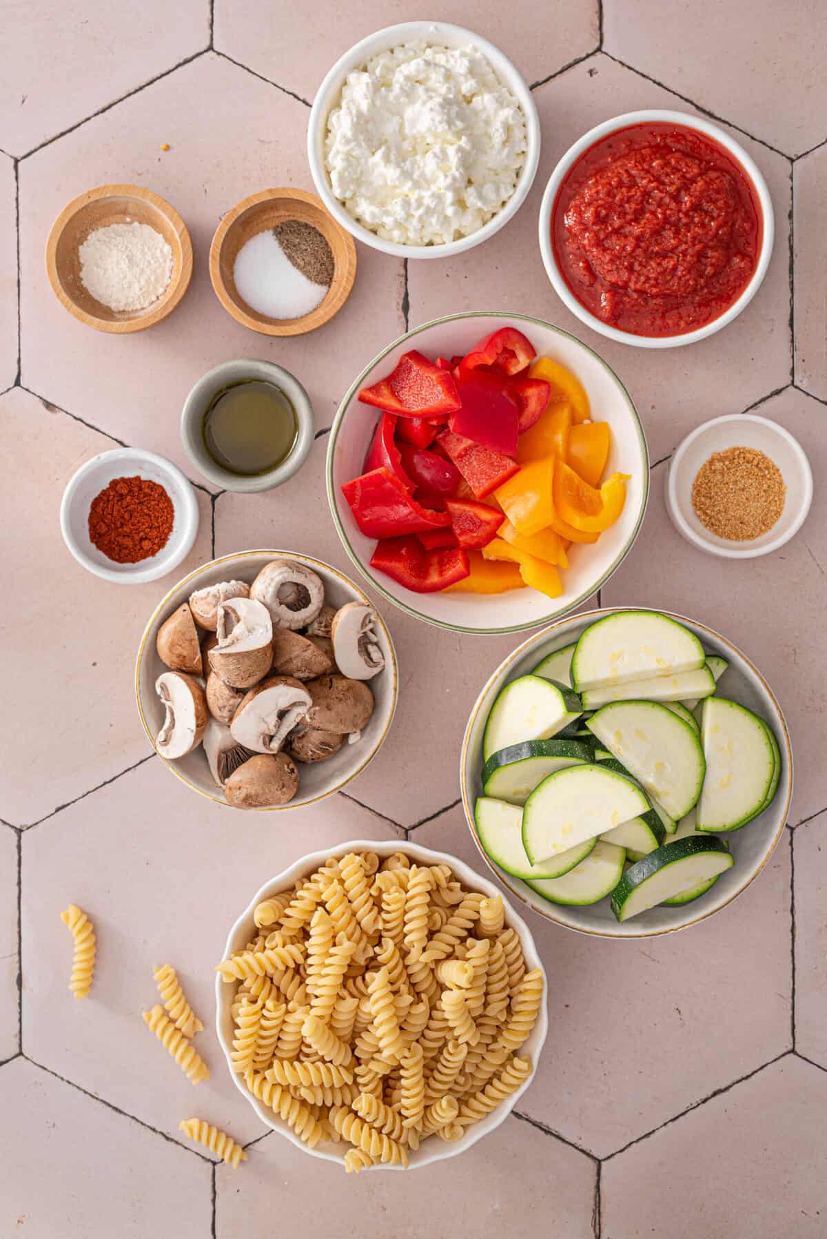 overview shot of all ingredients used to make veggie pasta.