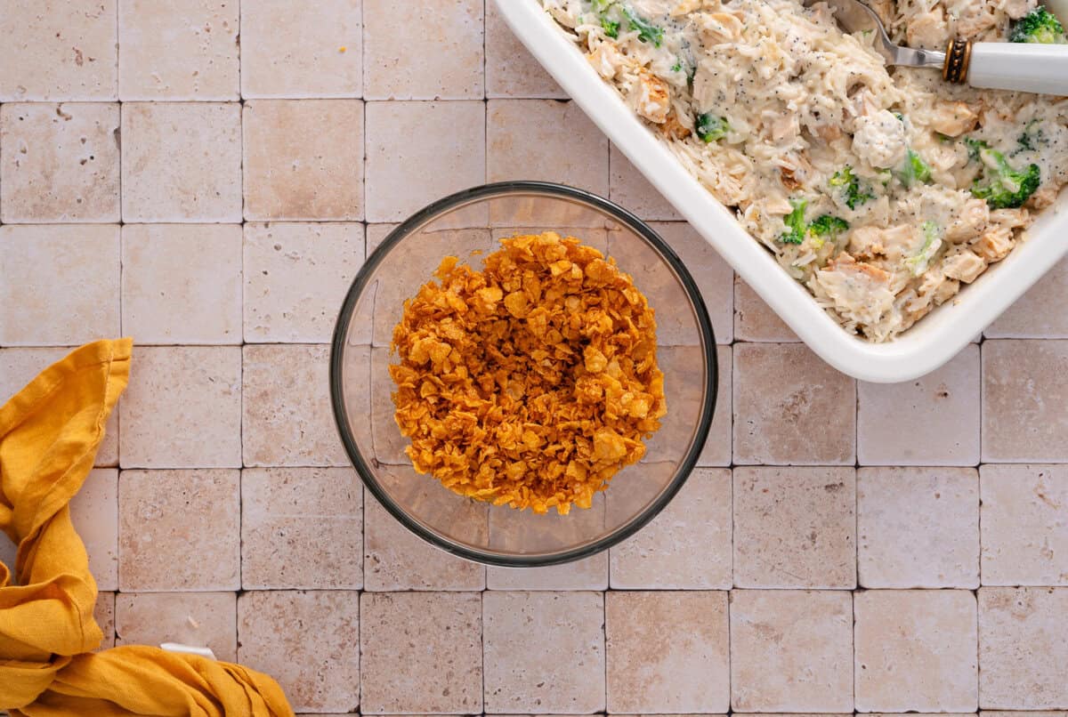 crushed cornflakes and butter in a bowl mixed. 