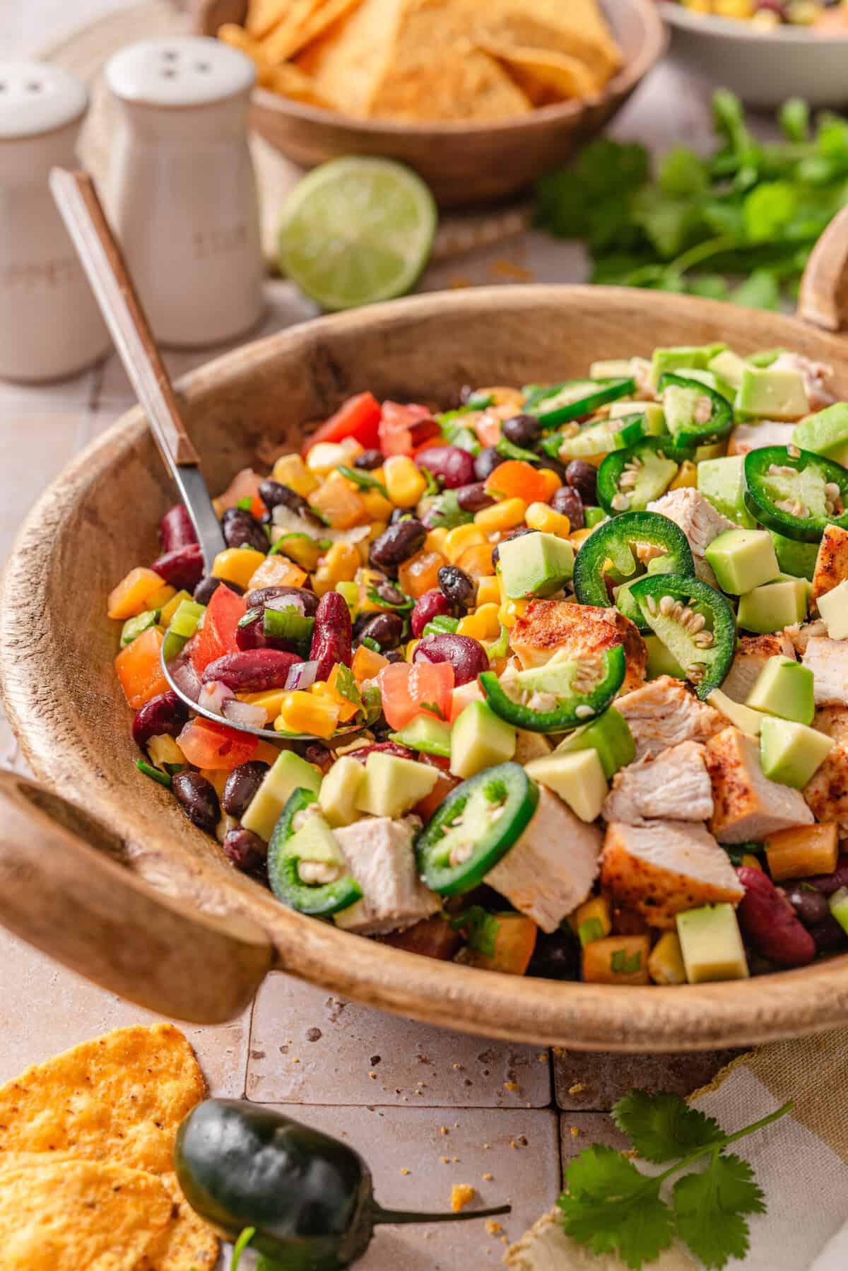 Side angle shot of my cowboy caviar salad served with chicken.