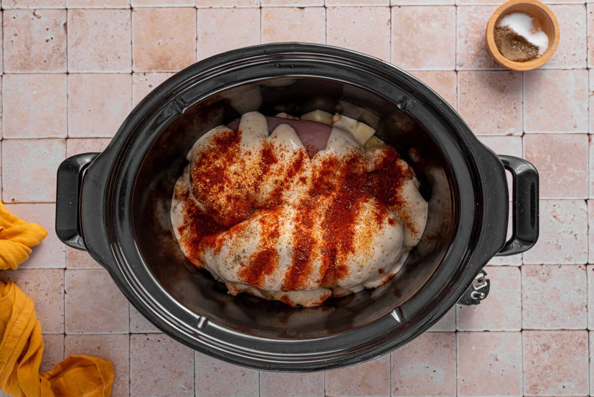 Overhead shot of all the ingredients in slow cooker.