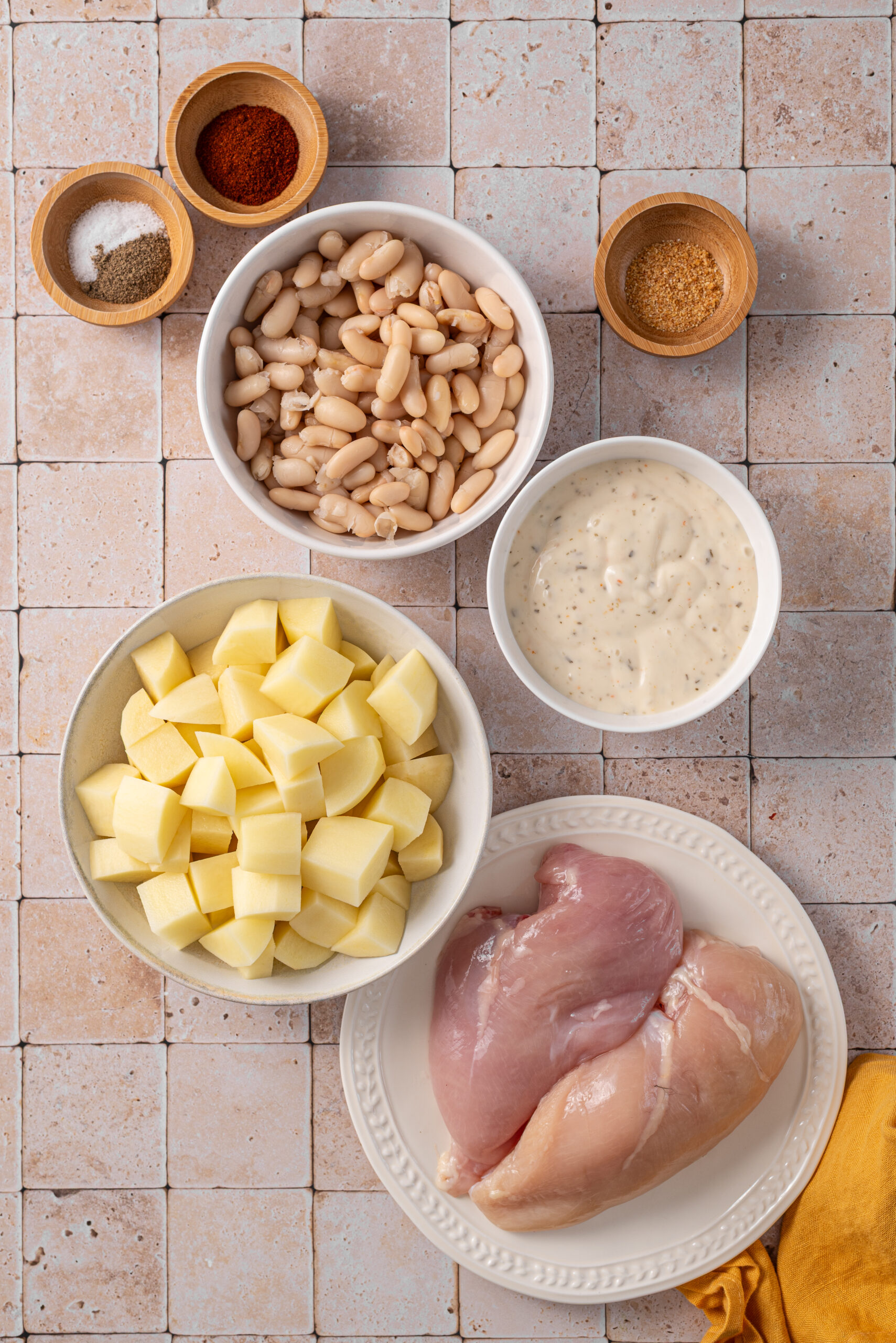 Overhead shot of all ingredients needed for the ranch chicken in the slow cooker.