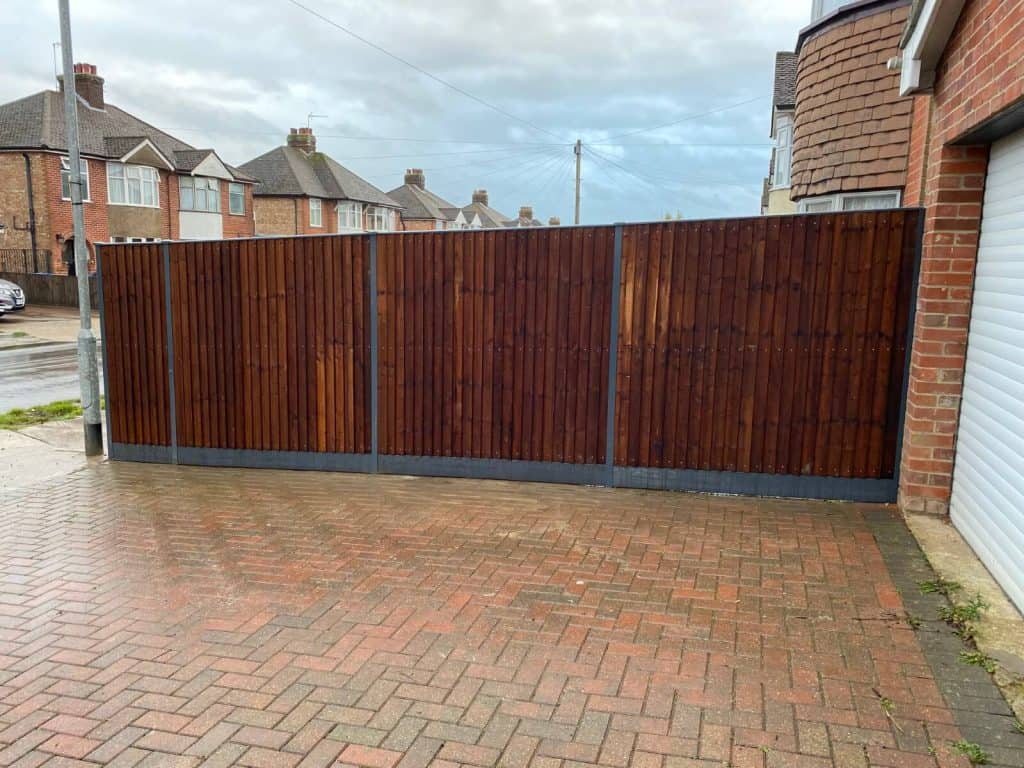 Durable wooden garden fence installed by EM Fencing in Suffolk.