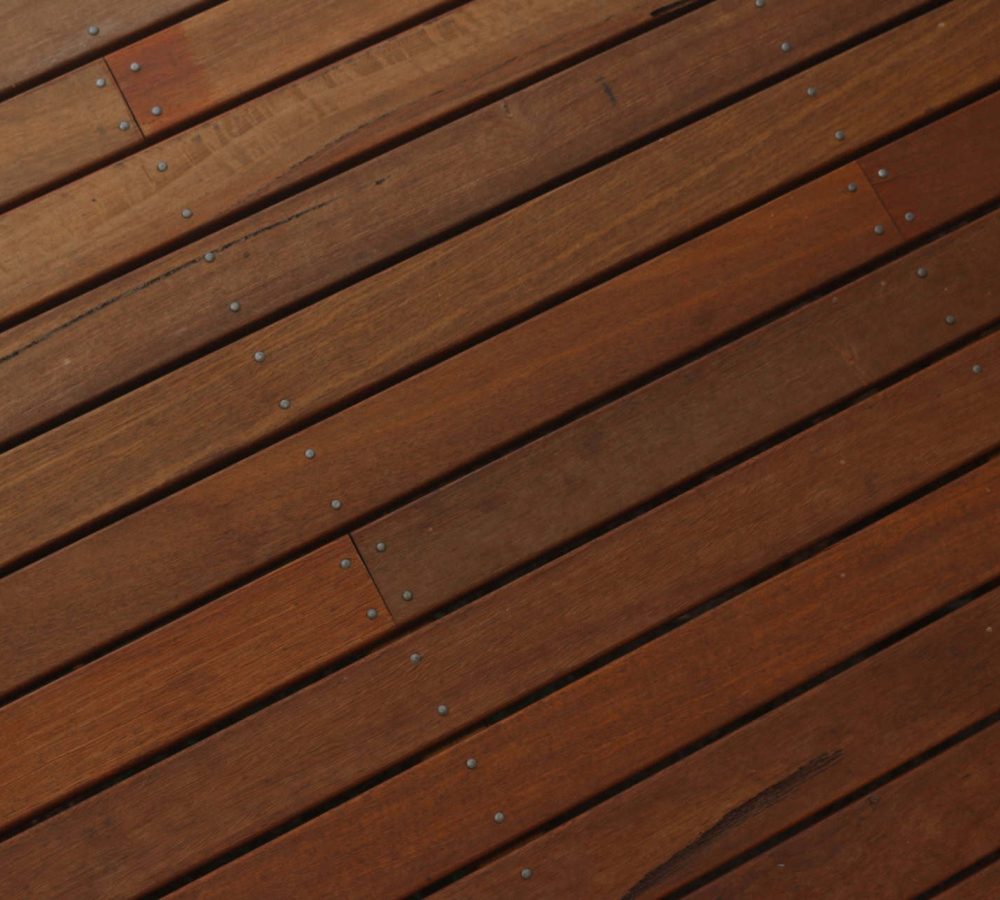 Close-up of high-quality wooden decking with evenly spaced planks.