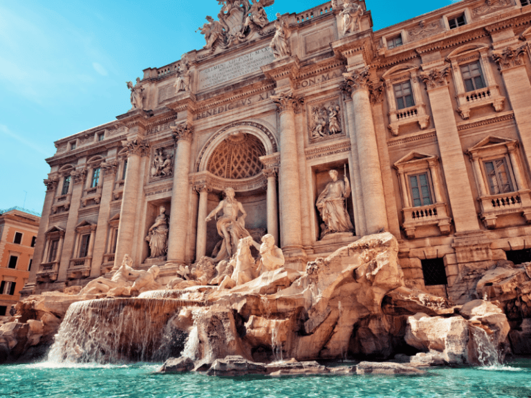 Iconic Roman fountain featuring detailed sculptures and cascading water, perfect for family-friendly sightseeing in the Eternal City.