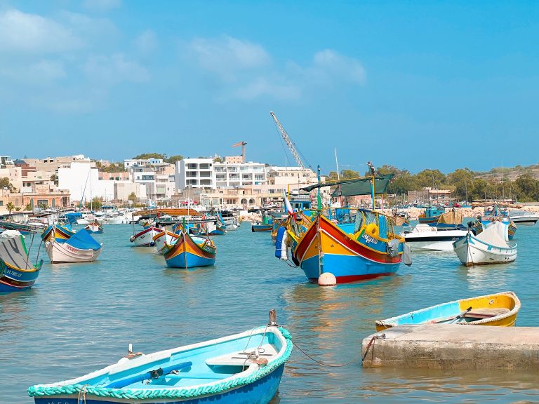 Beautiful Australian harbor featuring colorful boats and calm waters, capturing a serene maritime scene during daytime.