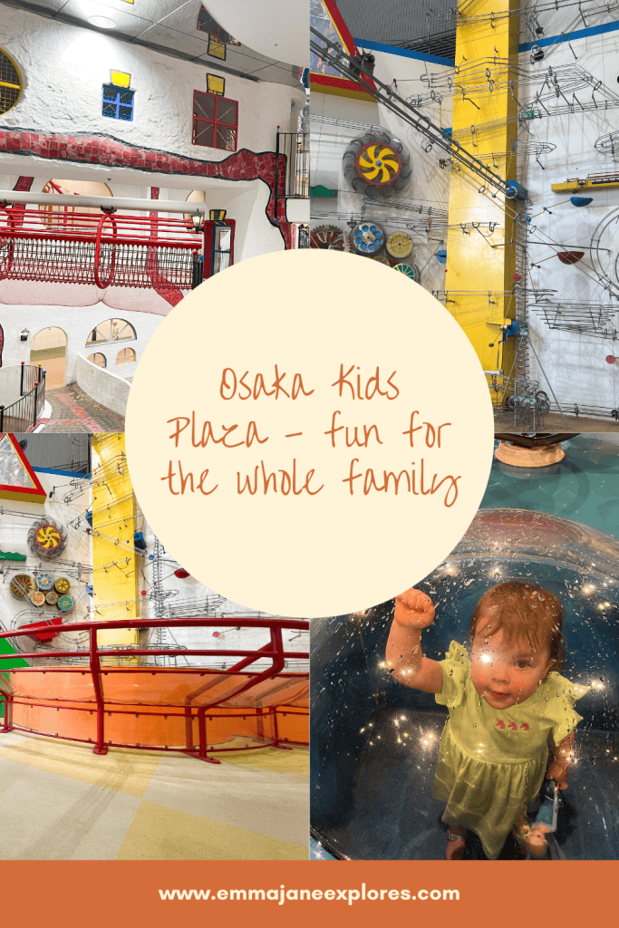 Bright indoor play area with climbing structures and water features for children.
