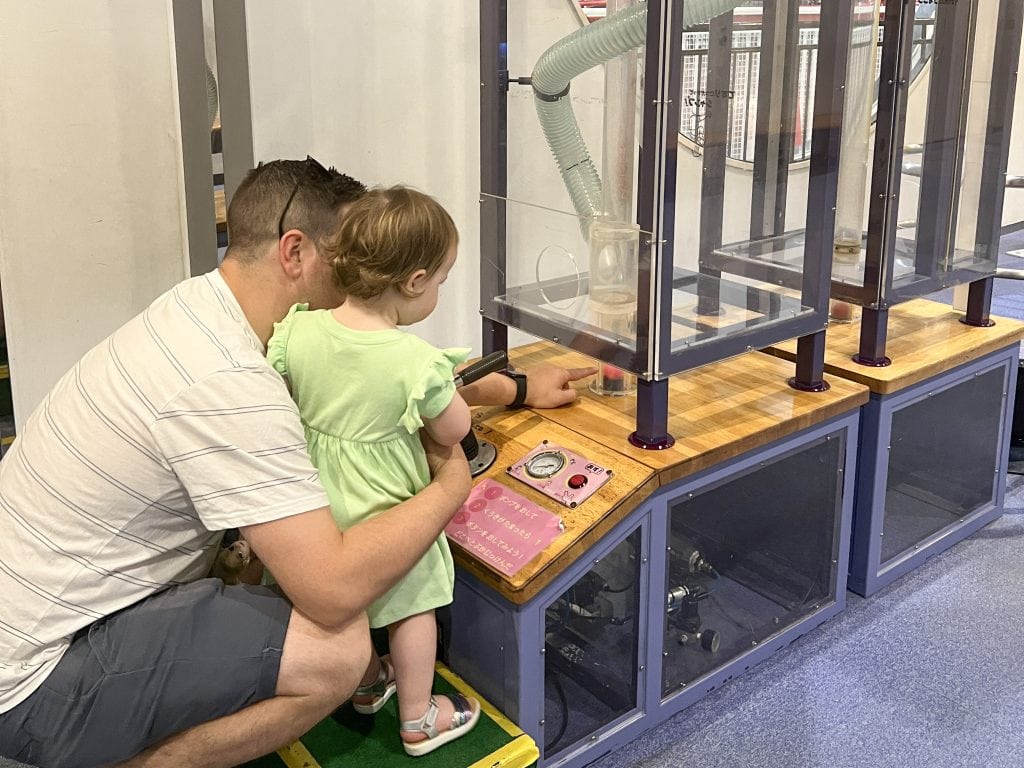 Experimenting with dad at the Osaka Kids Plaza