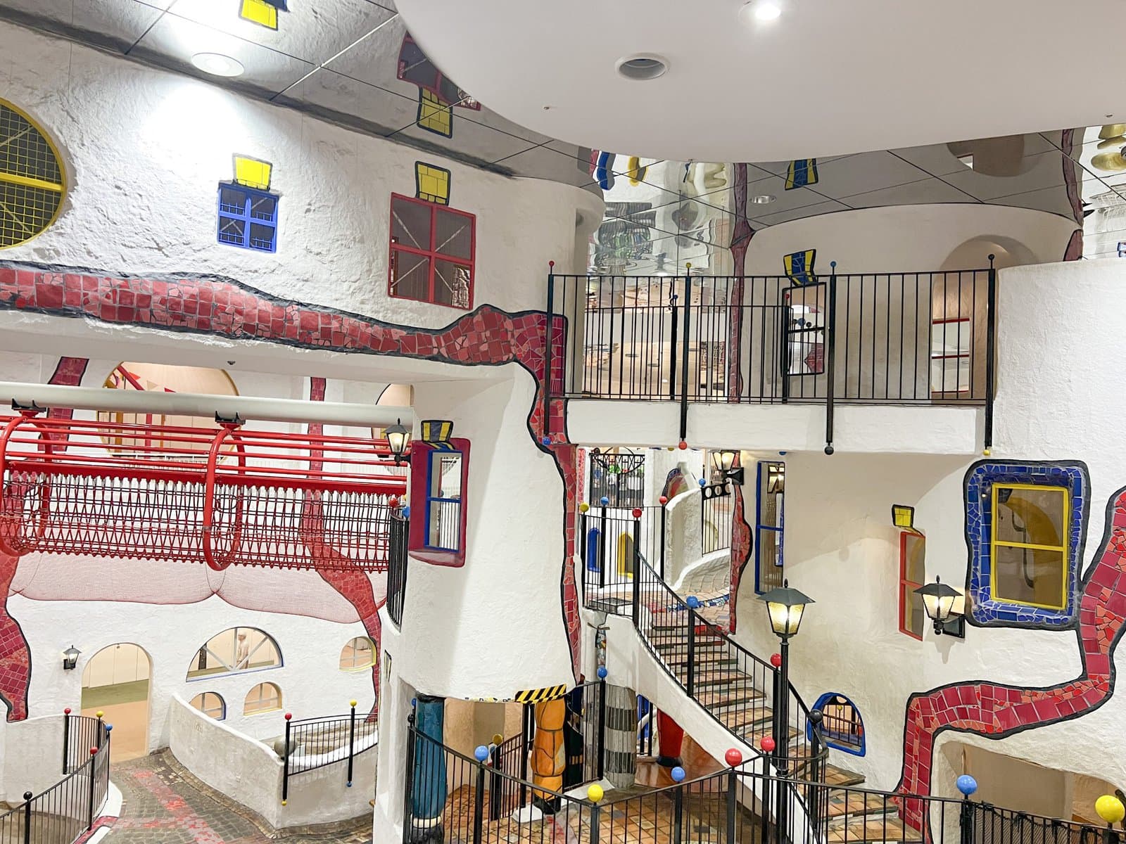 Bright indoor play area with colorful, whimsical design and multiple levels for children to explore and enjoy.