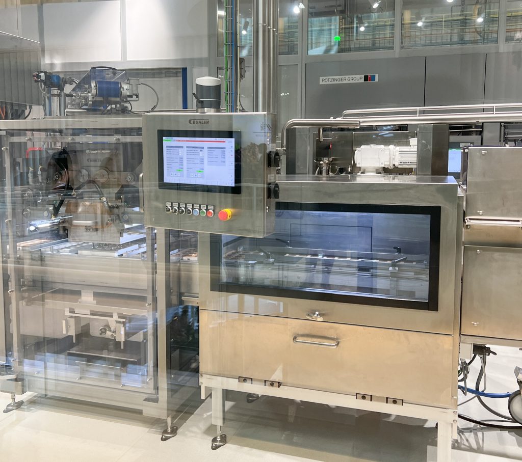 Advanced chocolate production machinery at Lindt Home of Chocolate.