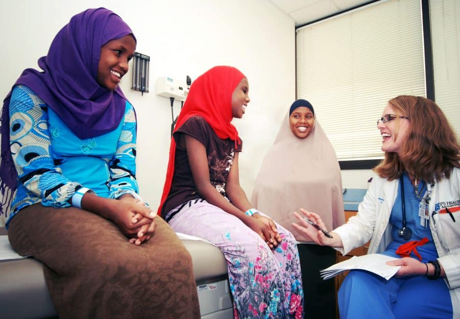 Doctor with diverse patients