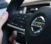 nissan logo on black steering wheel