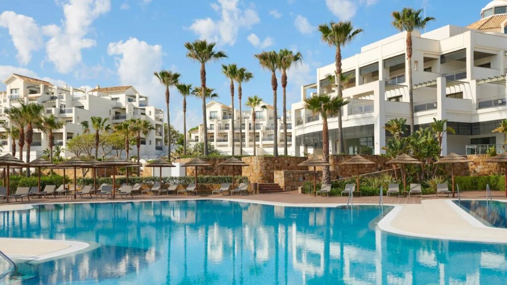 Resort pool with palm trees