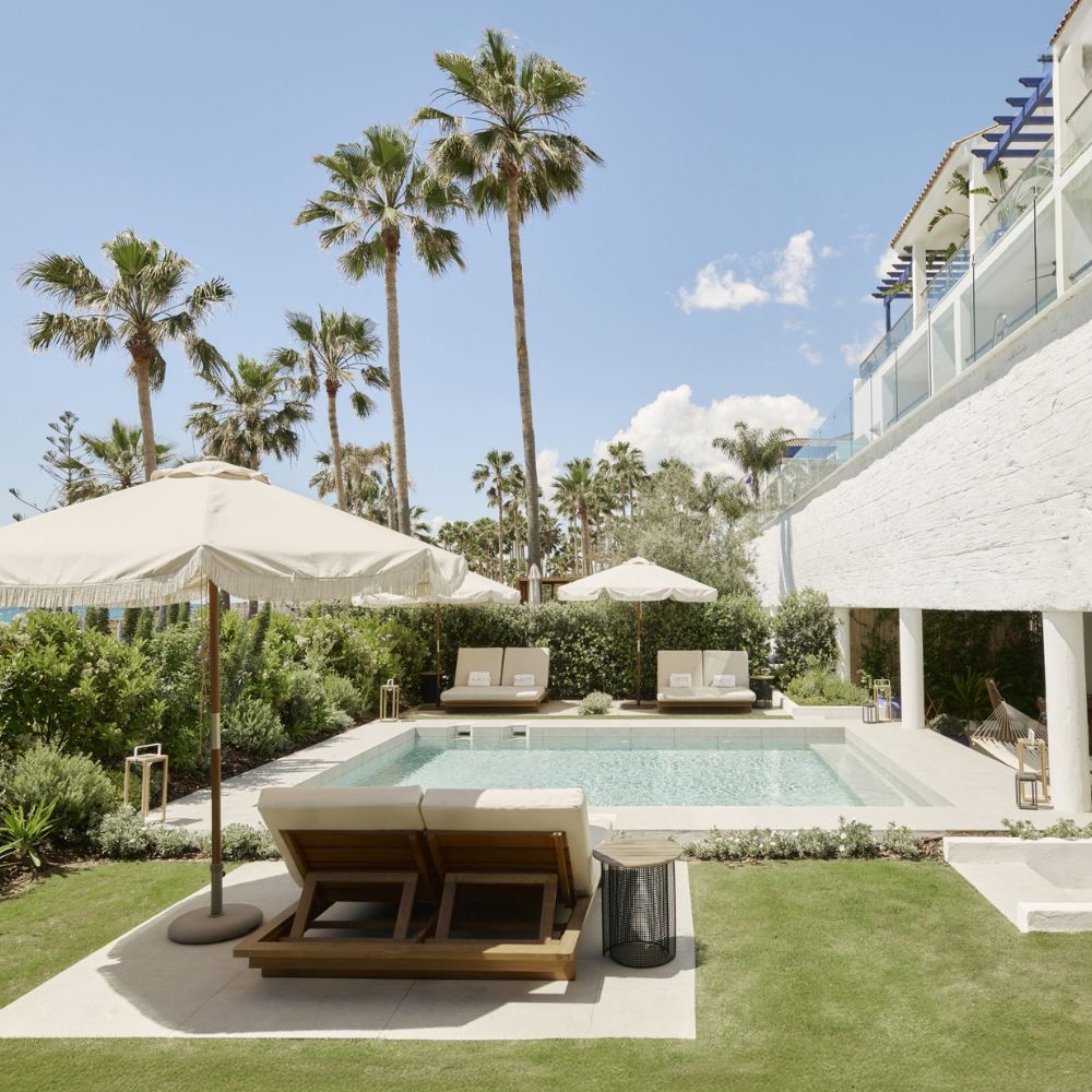 Resort pool with lounge chairs.