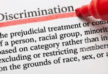 Discrimination highlighted with red marker on a document, concerning the Discriminaton in European school
