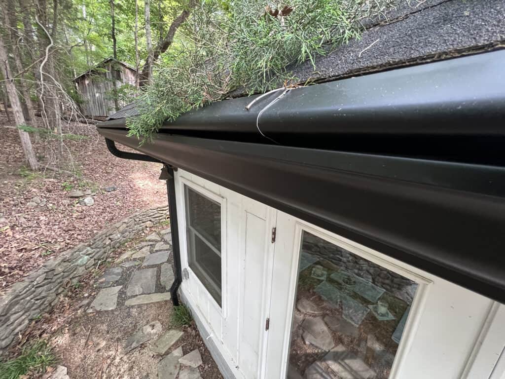 Clog-free gutter system with protective cover at a house in Kentucky. | Ever Clean Clog-Free Gutter Systems - Kentucky, Cincinnati, & North Carolina Gutter system installed to prevent clogs and maintain drainage in Kentucky homes.