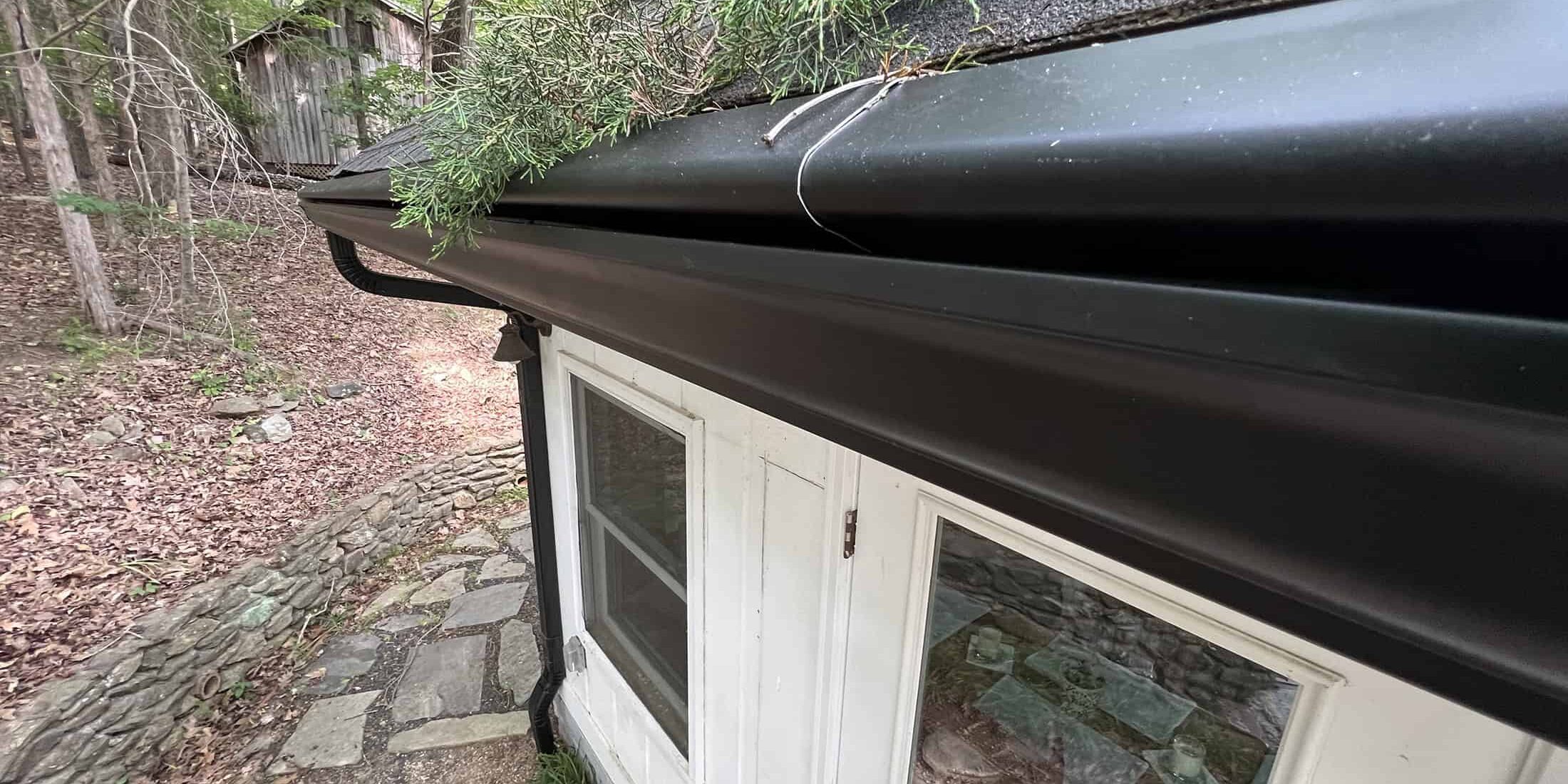 Gutter system installed to prevent clogs and maintain drainage in Kentucky homes.