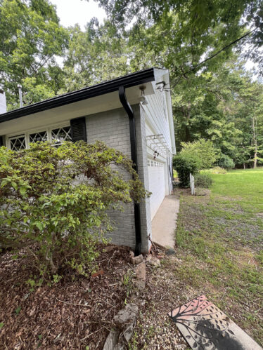 Efficient gutter system preventing clogs for Kentucky homes.