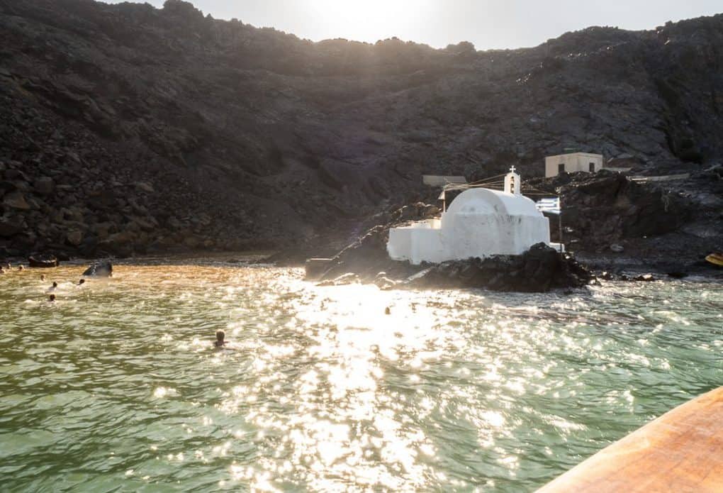 Swim on the volcano crater in Santorini Greece