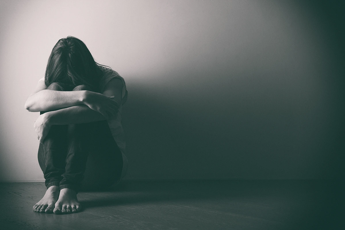 woman showing symptoms applicable for a depression research study