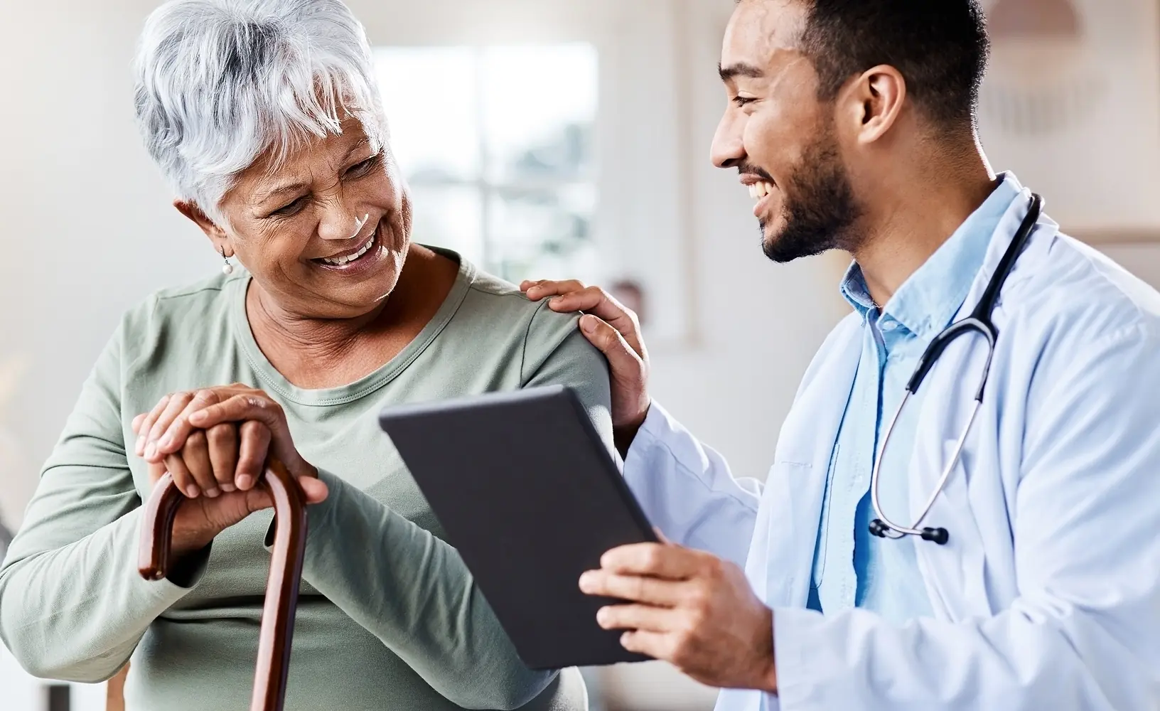 Doctor and older woman conversing