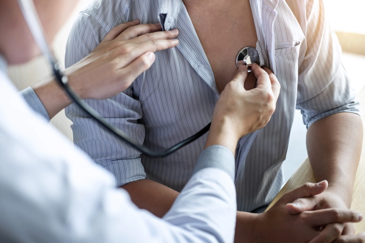 doctor evaluating a patient for a heart failure prevention research study