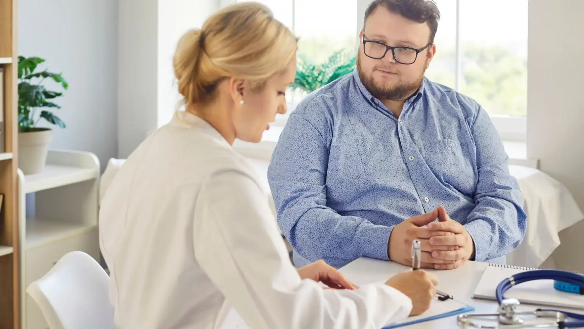 doctor examining a patient for clinical trials cary nc