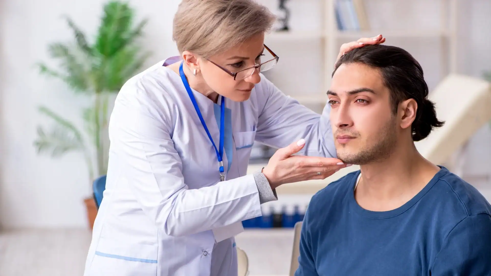 doctor examining a patient for dermatology clinical trials murfreesboro tn