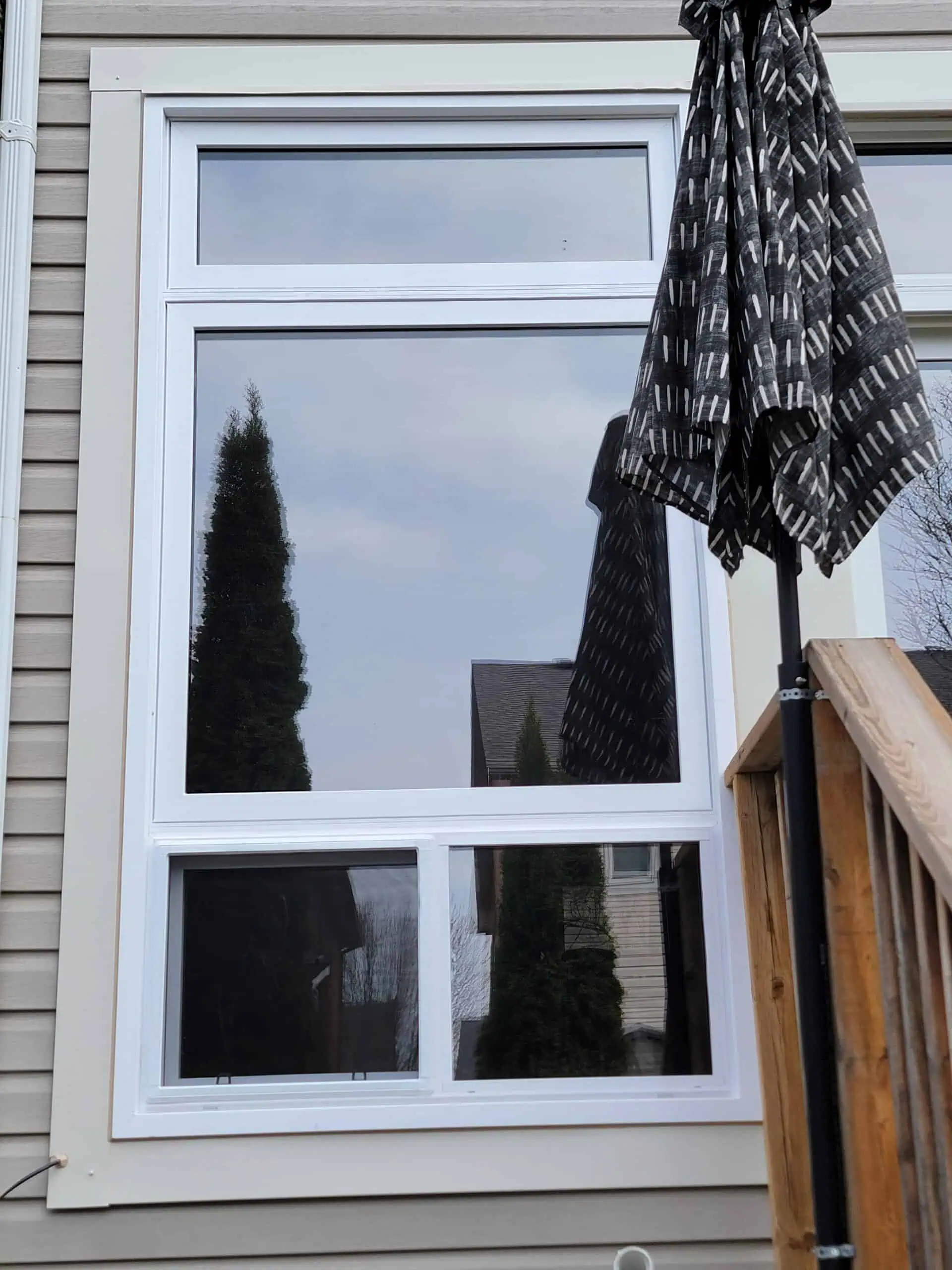 Window film installation on Burlington commercial building by Film Bros