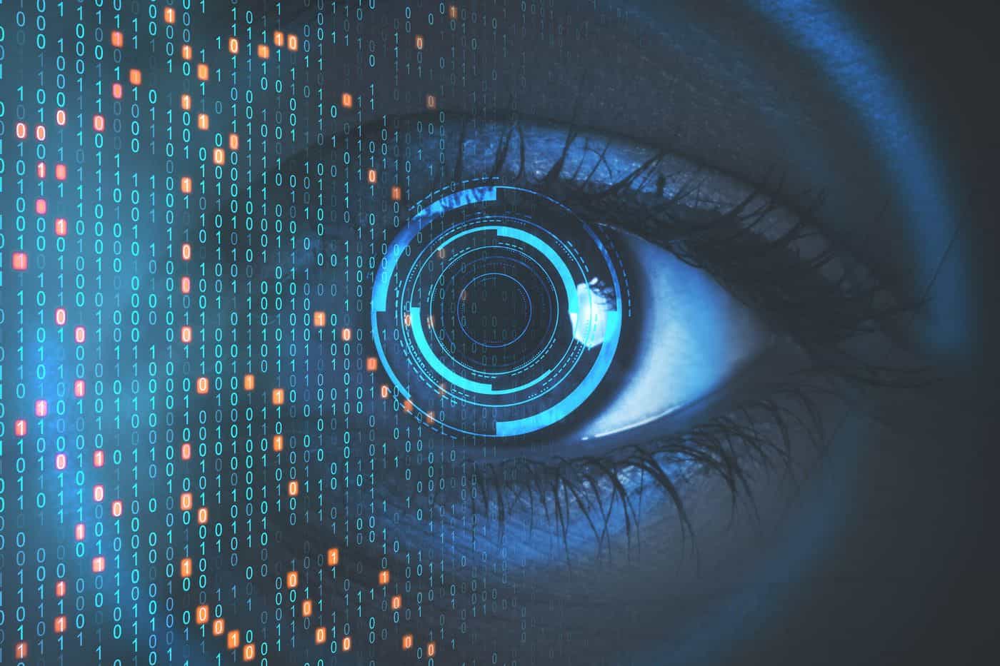 Ojo humano con elementos digitales y código binario en la retina.