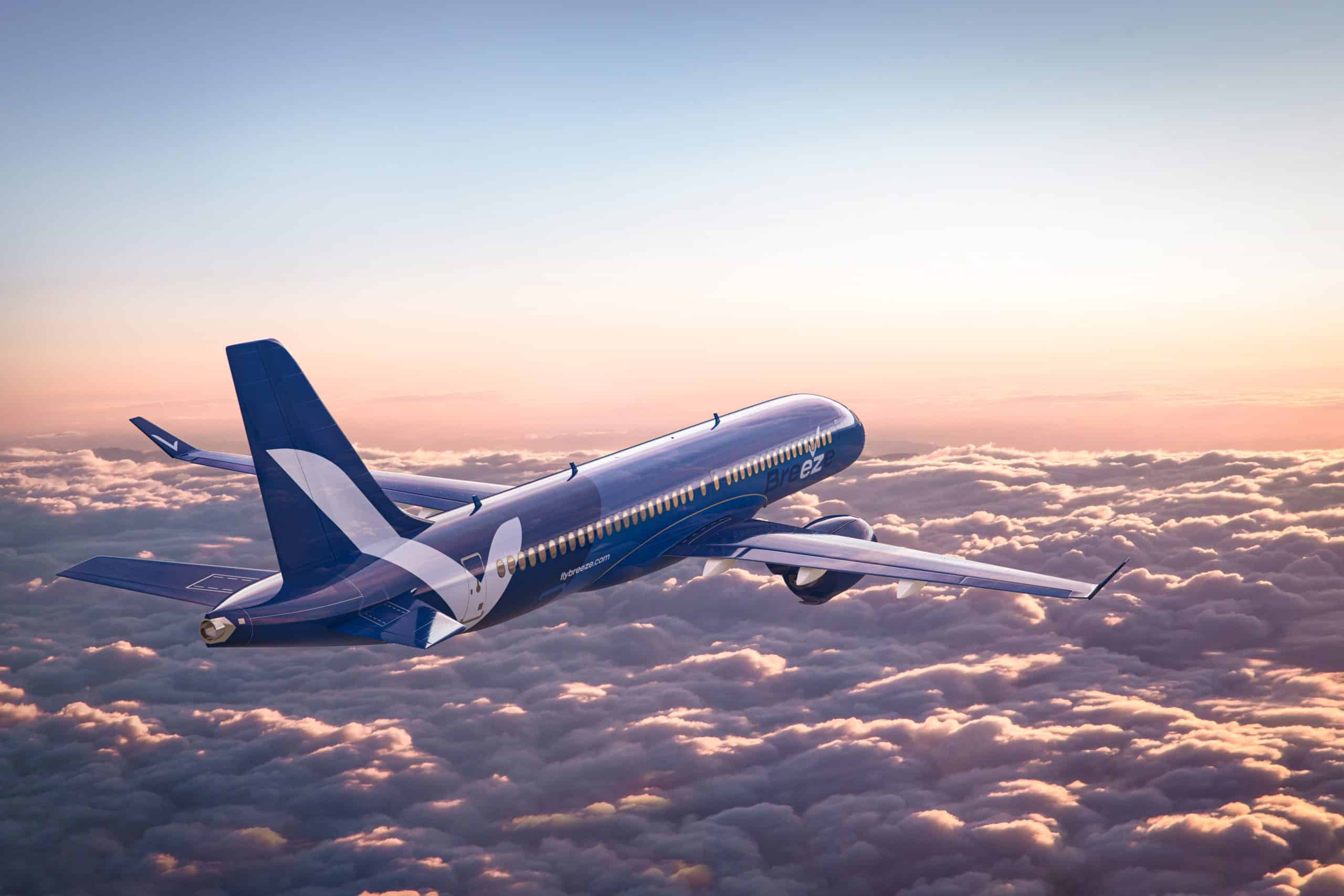 Breeze Airways A220 flying above the clouds