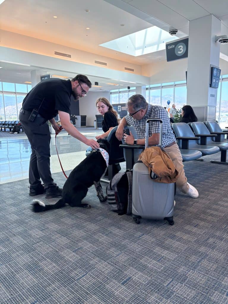 Taking a break from airfield duties to spread tail wags and good vibes