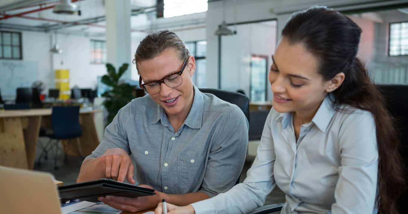 business-executives-working-office 1 business-executives-working-office 1