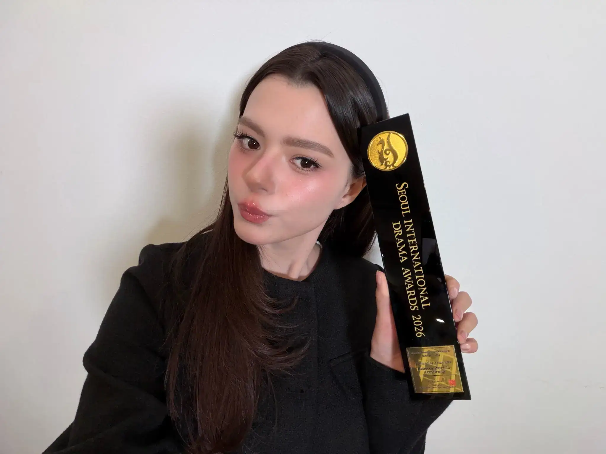 Becky Armstrong with her Outstanding Asian Star trophy at the Seoul International Drama Awards 2026