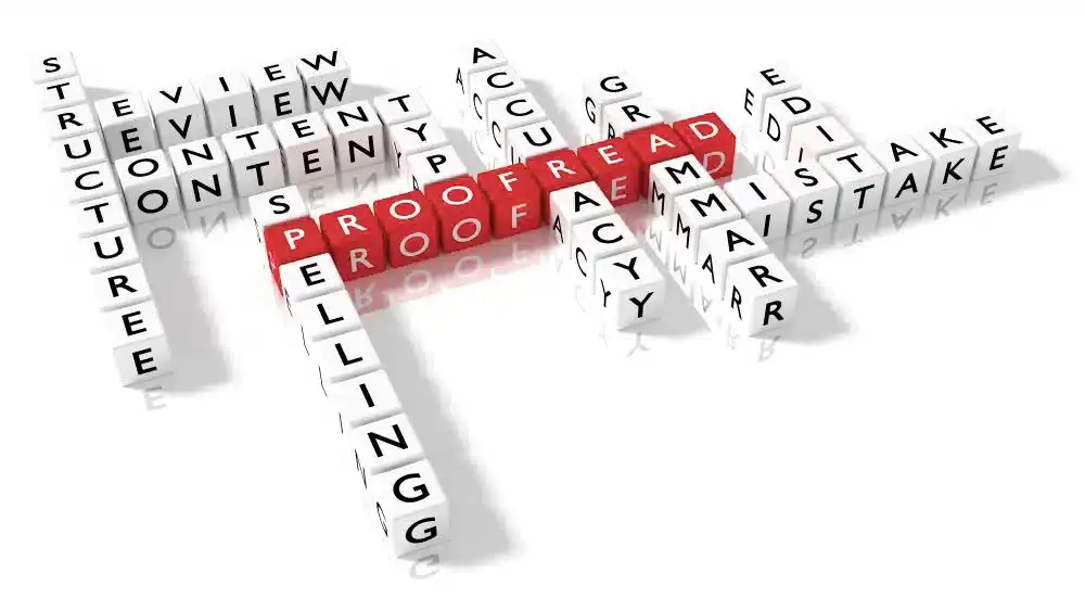 Image of blocks that spell words like proofreading and spelling.