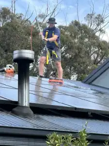 G2G Gutter cleaning Solar Panels with a soft brush to optimise energy generation