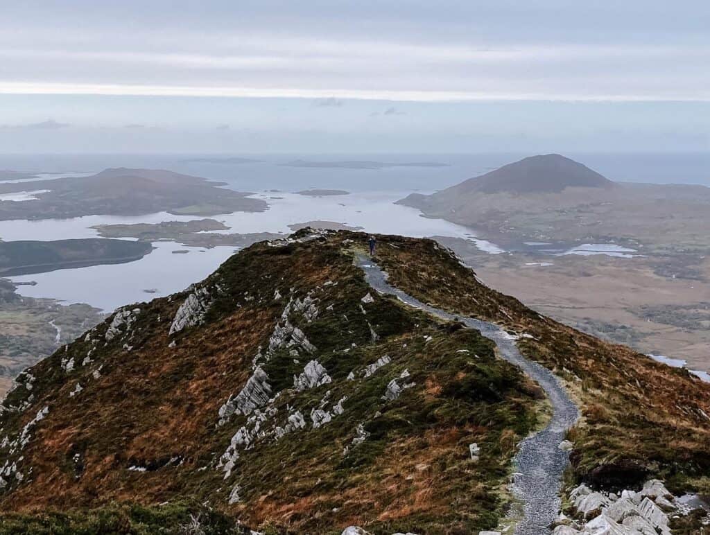 Mountain path overlooking tranquil waters