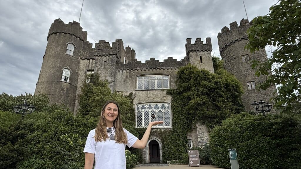 Visitor outside Malahide Castle on a Howth and Malahide private day tour from Dublin
