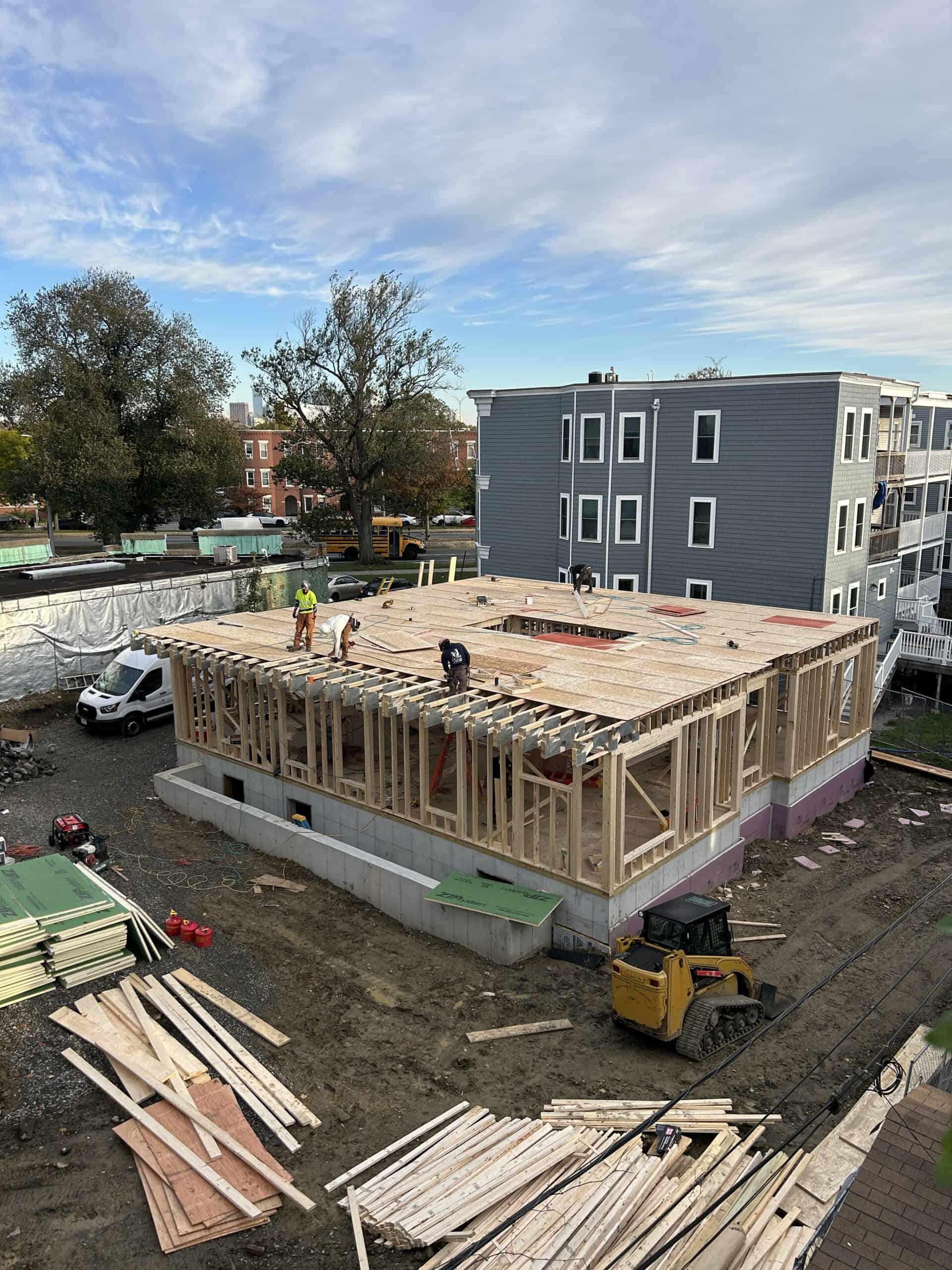 Boston construction site with active excavation and foundation work related to construction accident and third-party injury claims in Massachusetts