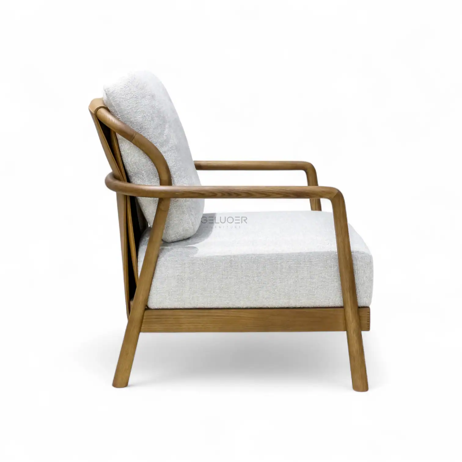 Comfortable modern wooden armchair with plush fabric cushion, perfect for stylish home furniture.