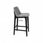 Elegant upholstered bar stool with a wooden frame, perfect for modern kitchen or bar seating.