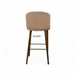 Modern beige upholstered bar stool with wooden legs, ideal for contemporary kitchen or bar area.