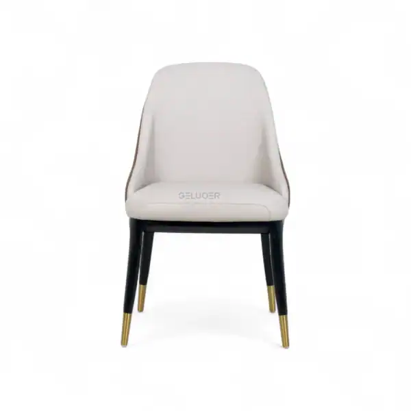 Elegant white upholstered dining chair with black and gold metal legs from Geluoer Furniture.